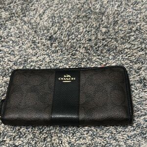 Coach Dark Leather Clutch with Gold Logo